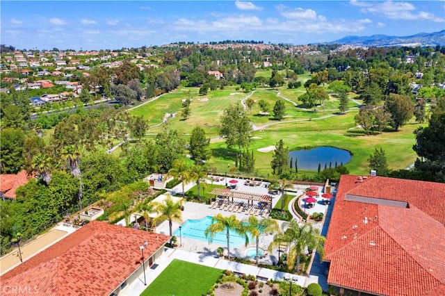 bird's eye view featuring golf course view and a water view