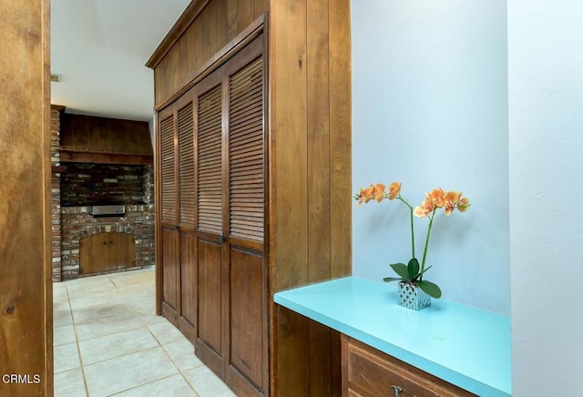 hallway with light tile patterned floors