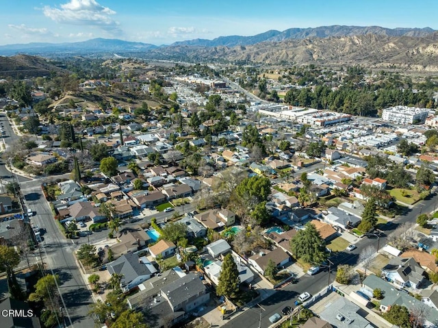 drone / aerial view featuring a mountain view and a residential view