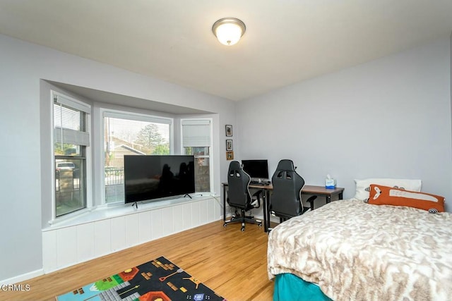 bedroom featuring wood finished floors