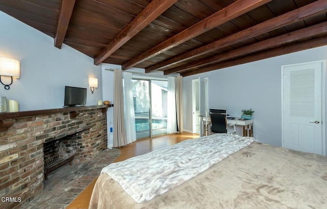 bedroom with beam ceiling, wooden ceiling, a fireplace, and access to outside