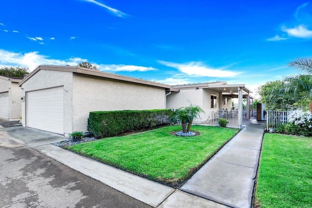 ranch-style home featuring a front yard, covered porch, stucco siding, concrete driveway, and a garage