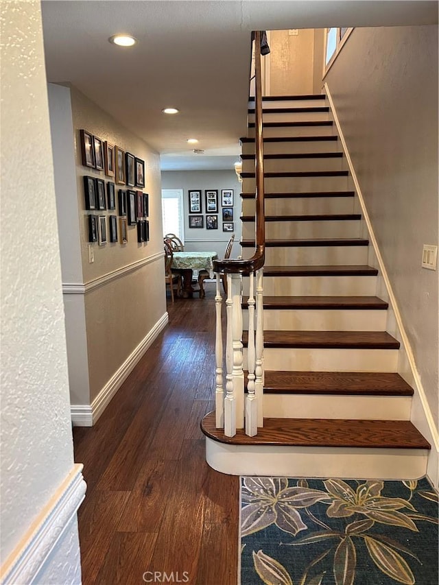 stairs with recessed lighting, baseboards, and hardwood / wood-style flooring
