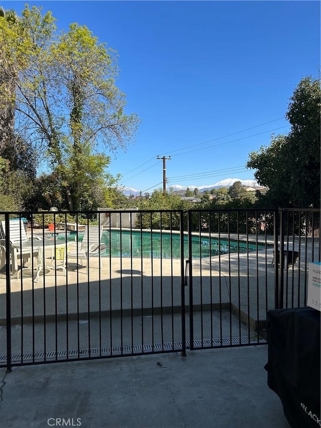 pool featuring fence