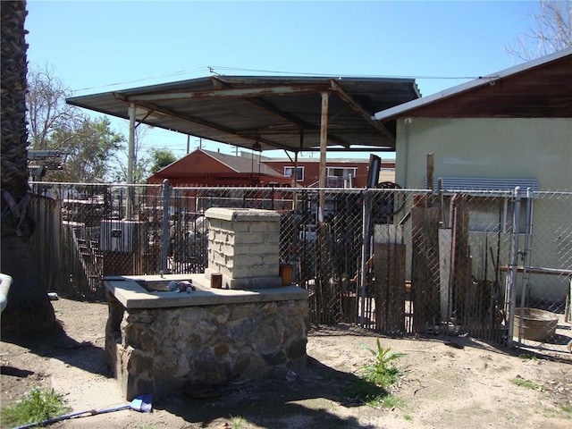 view of patio featuring fence