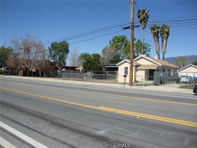 view of road featuring curbs and sidewalks