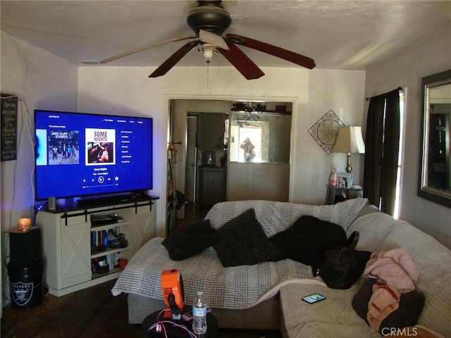 living room with a ceiling fan