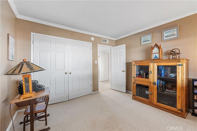 interior space with visible vents, baseboards, and ornamental molding