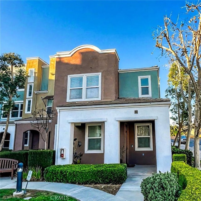 view of front of home with stucco siding