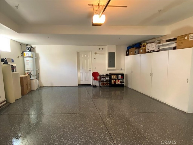 garage featuring electric panel, a garage door opener, and water heater