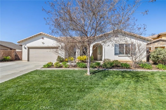 ranch-style home featuring a front yard, fence, stucco siding, concrete driveway, and a garage