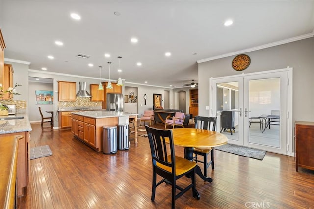 dining room featuring visible vents, recessed lighting, french doors, and dark wood-type flooring