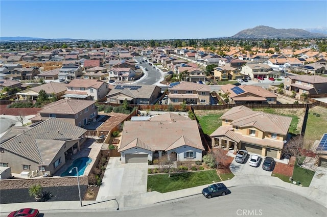 aerial view featuring a mountain view and a residential view