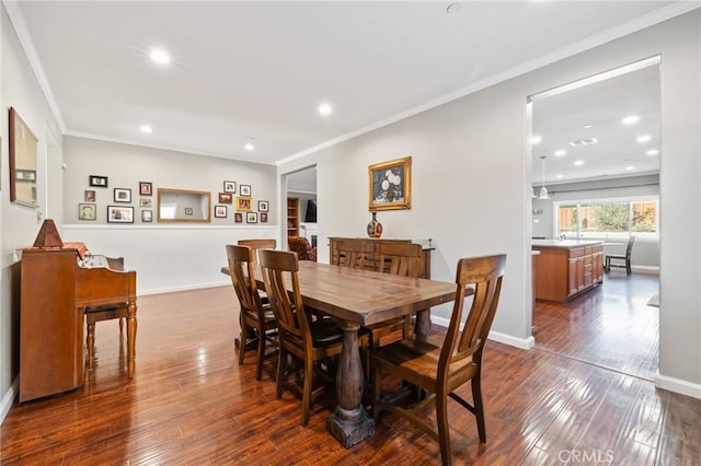 dining area with dark wood finished floors, recessed lighting, baseboards, and ornamental molding