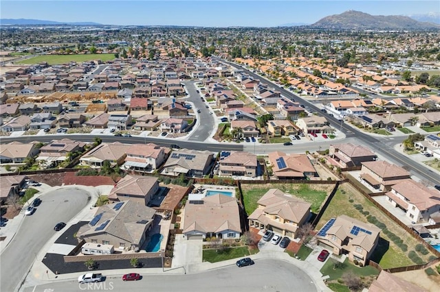 aerial view with a mountain view and a residential view