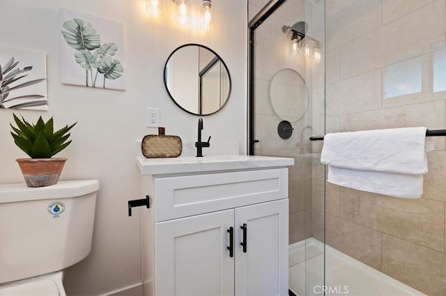 full bathroom with vanity, toilet, and tiled shower