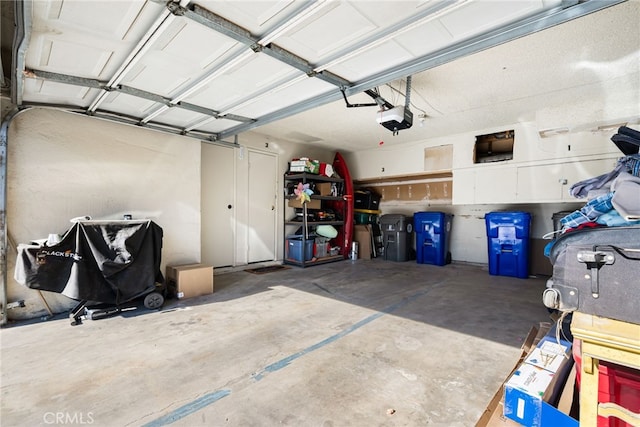 garage featuring a garage door opener