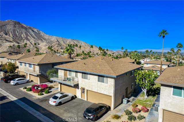 property view of mountains featuring a residential view