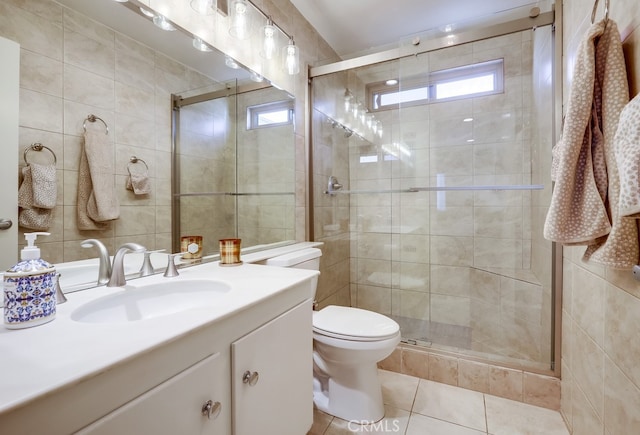 full bathroom with tile patterned flooring, a stall shower, and a wealth of natural light