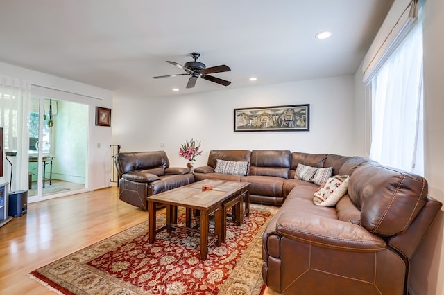 living area featuring light wood finished floors, recessed lighting, and ceiling fan