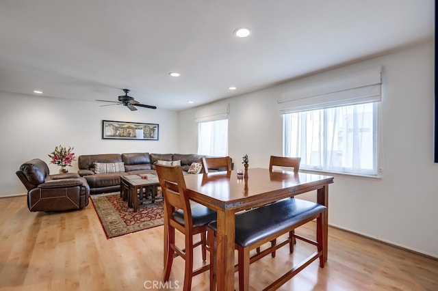 dining area with recessed lighting, ceiling fan, and light wood finished floors