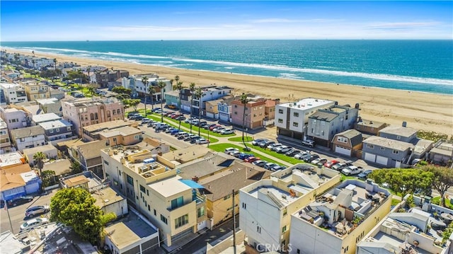 drone / aerial view with a view of the beach and a water view