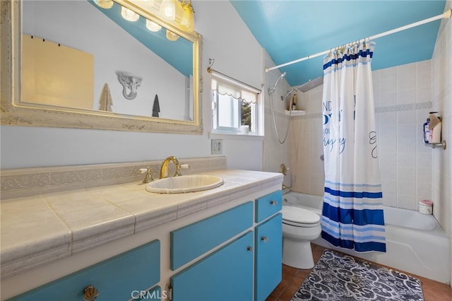 full bath featuring vanity, shower / bath combination with curtain, and toilet