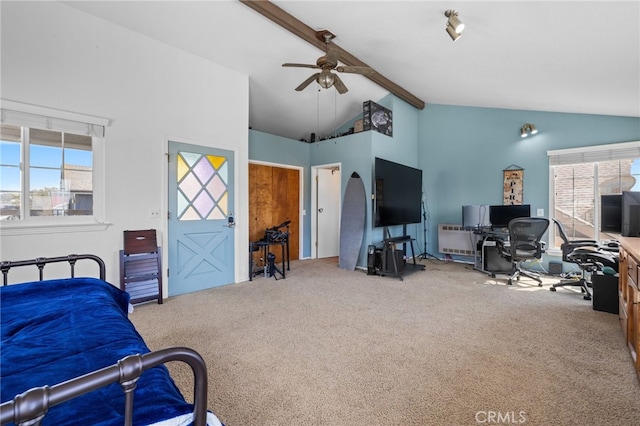 bedroom with a ceiling fan, beamed ceiling, carpet, and high vaulted ceiling