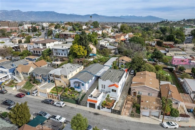 aerial view with a mountain view and a residential view