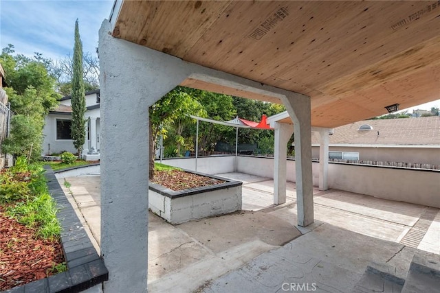 view of patio with fence