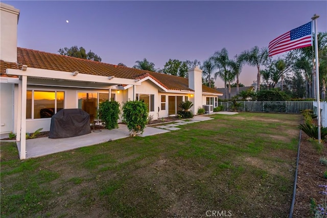 view of yard with a patio and fence