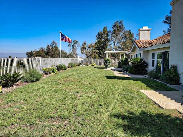 view of yard with a fenced backyard