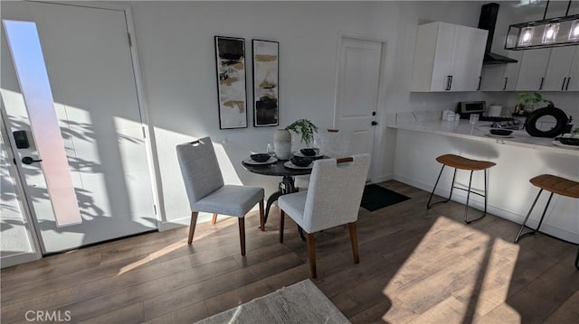 dining area featuring wood finished floors