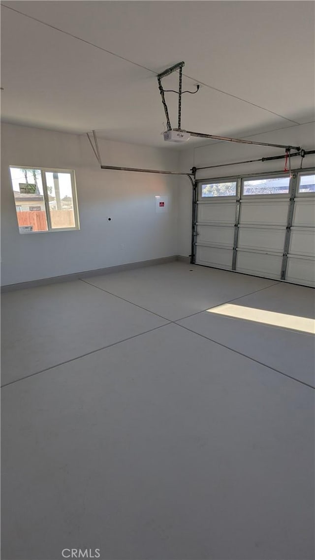 garage featuring baseboards