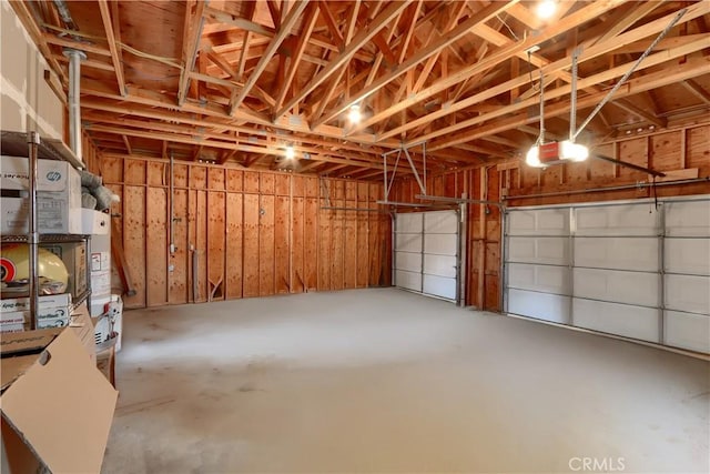 garage featuring a garage door opener