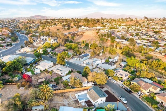 drone / aerial view with a residential view and a mountain view