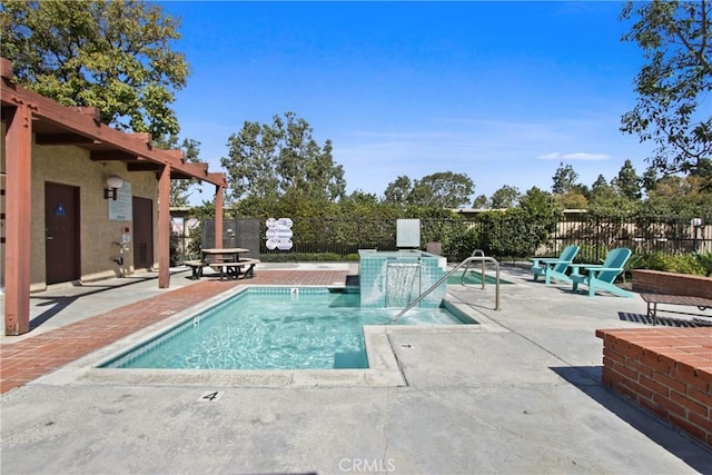 view of pool featuring a pool, a patio, and fence