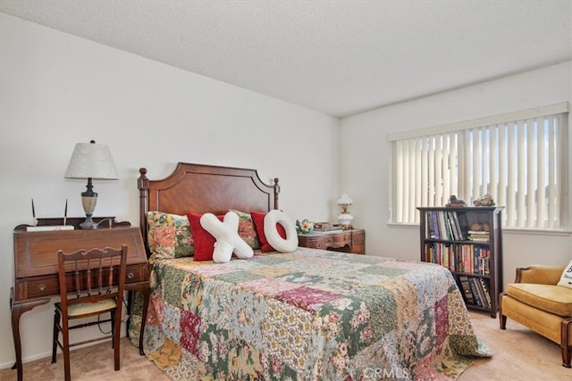 carpeted bedroom with a textured ceiling