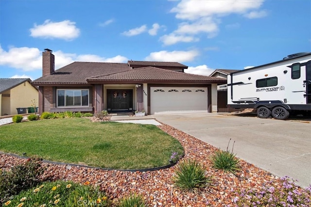 ranch-style home featuring a front lawn, concrete driveway, a garage, a chimney, and a tiled roof