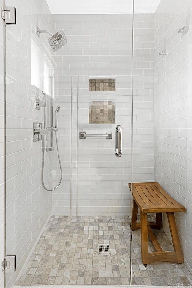 bathroom featuring a stall shower