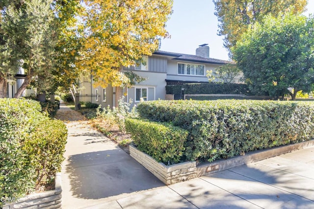 view of front of property with a chimney