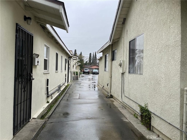 view of side of property featuring stucco siding