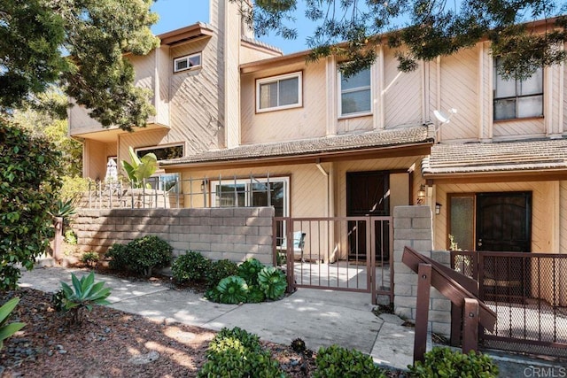 view of property with a gate and a fenced front yard