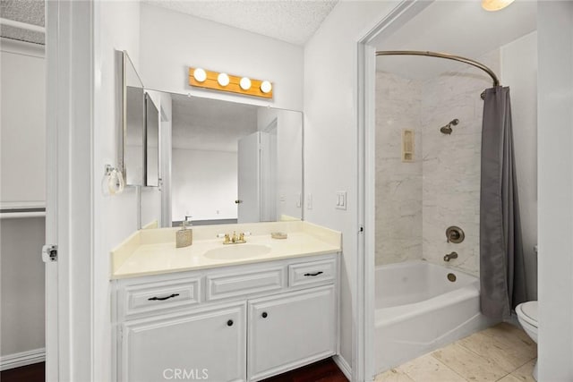 full bathroom with a textured ceiling, shower / bath combo, vanity, and toilet