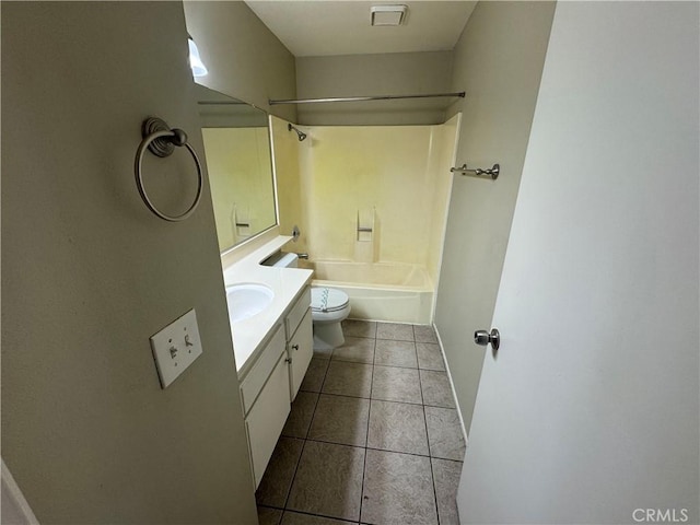 full bath featuring vanity, baseboards, bathing tub / shower combination, tile patterned floors, and toilet