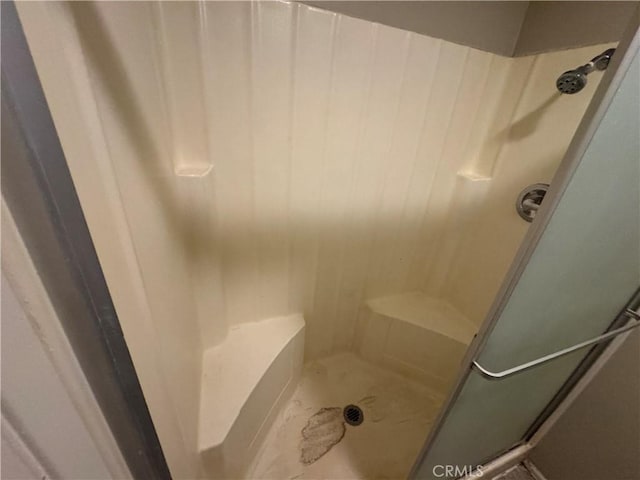 full bathroom with a shower stall