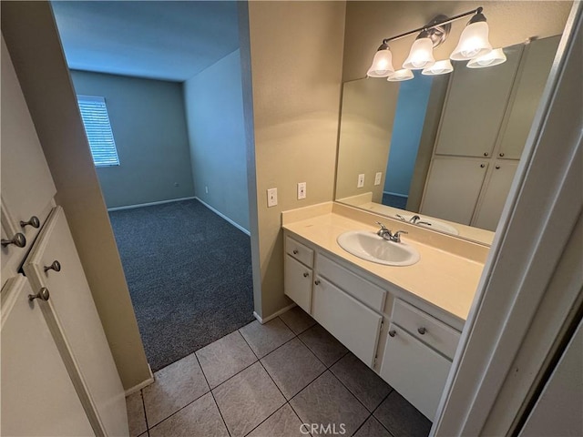 bathroom with tile patterned floors and vanity