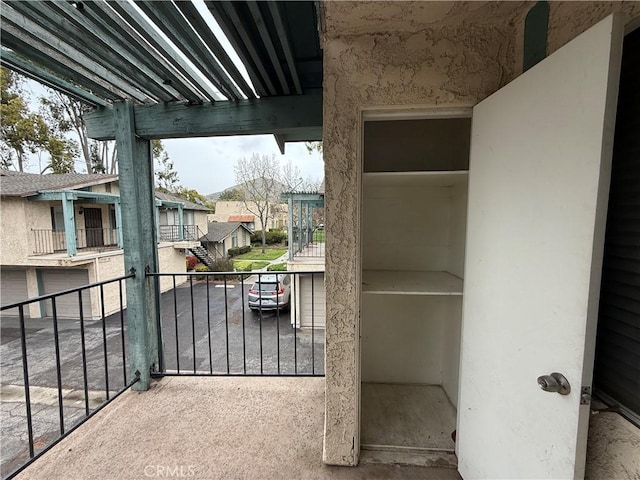 balcony featuring a residential view