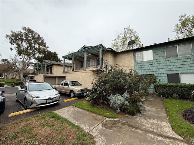 view of front of property featuring stucco siding