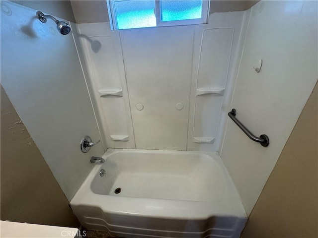 bathroom featuring washtub / shower combination